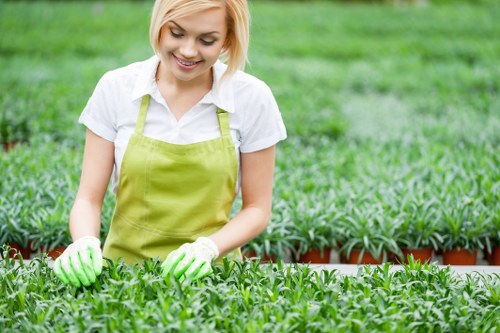 Trained gardener wearing protective equipment